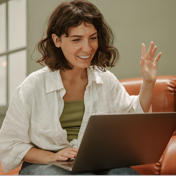 young woman looking laptop